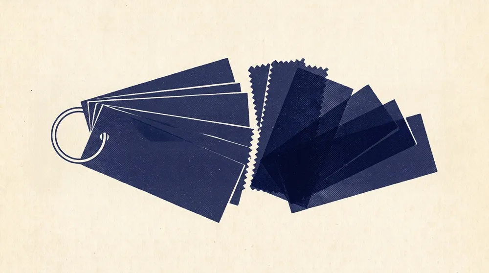 A fabric swatch book fanned open, its sample cards stepping outward in width.